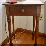 F114. Single drawer antique side table with turned legs.
